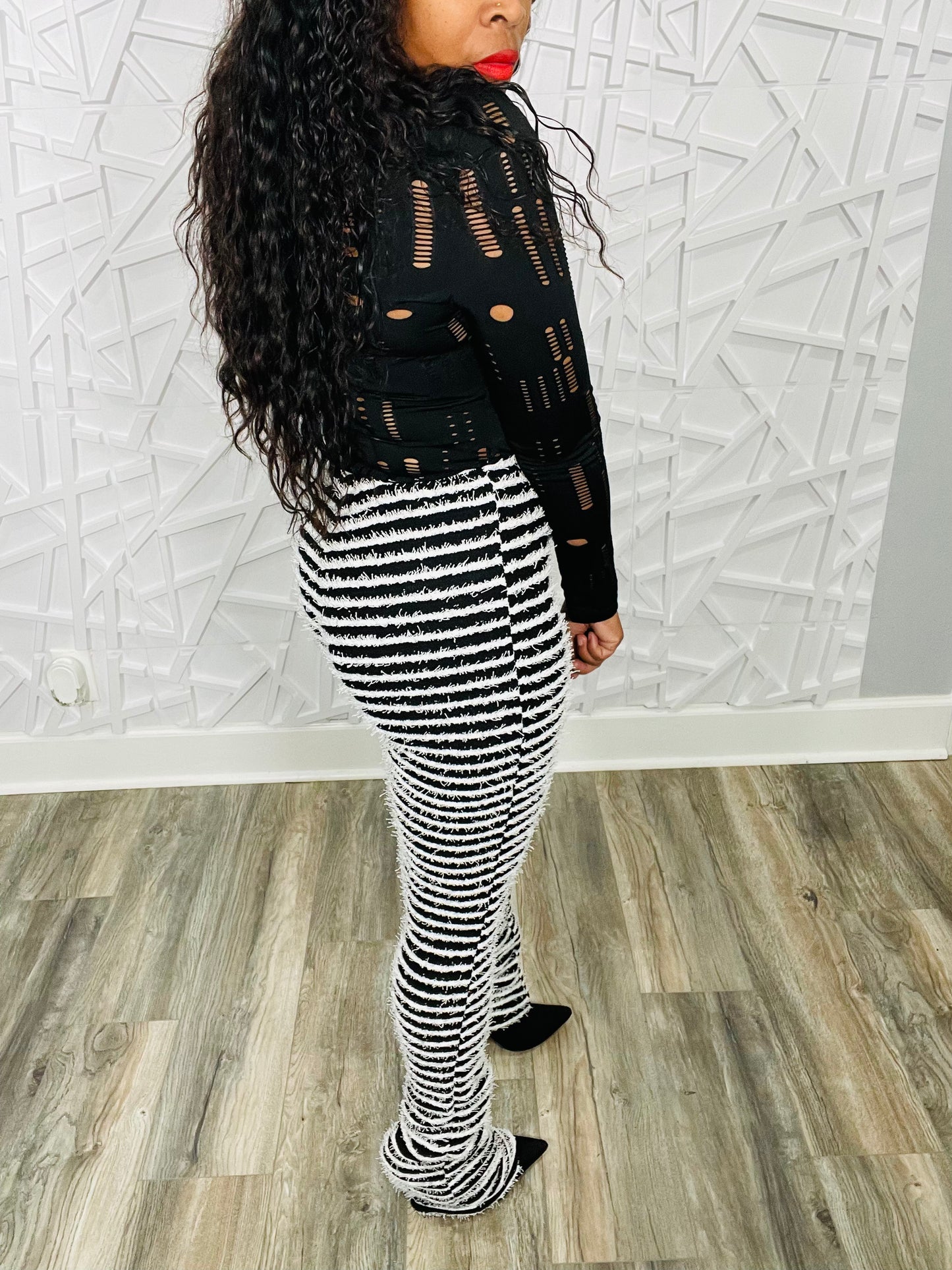 Distressed in Pretty Bodysuit