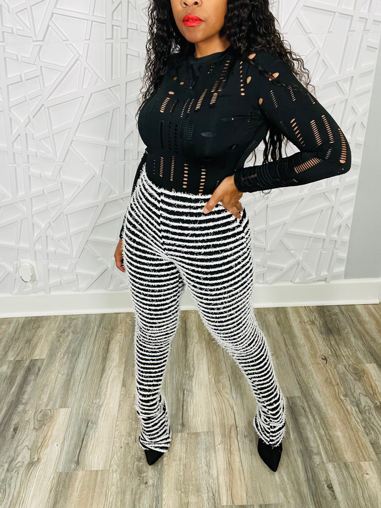 Distressed in Pretty Bodysuit